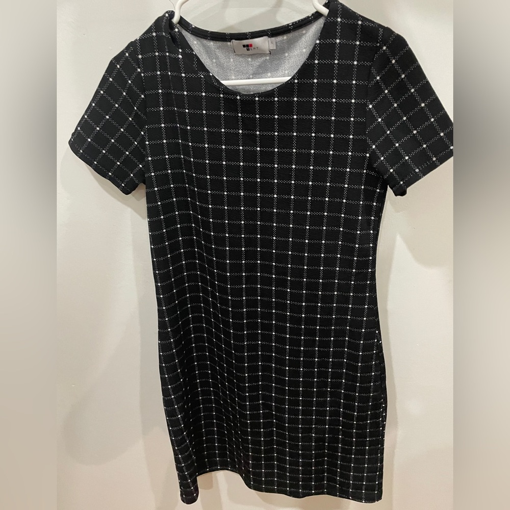 Stretchy grid black mini dress